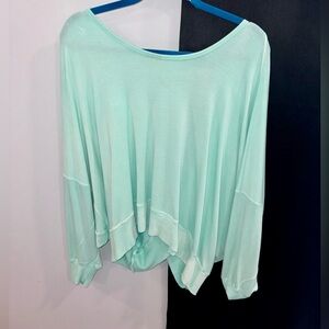 Free people light blue open back shirt